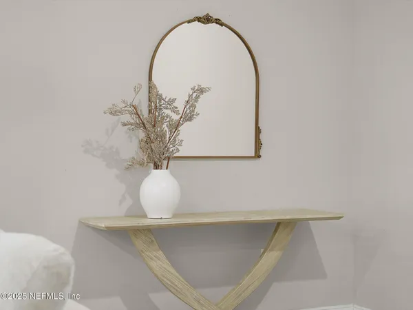 a vase of flowers sitting on a table