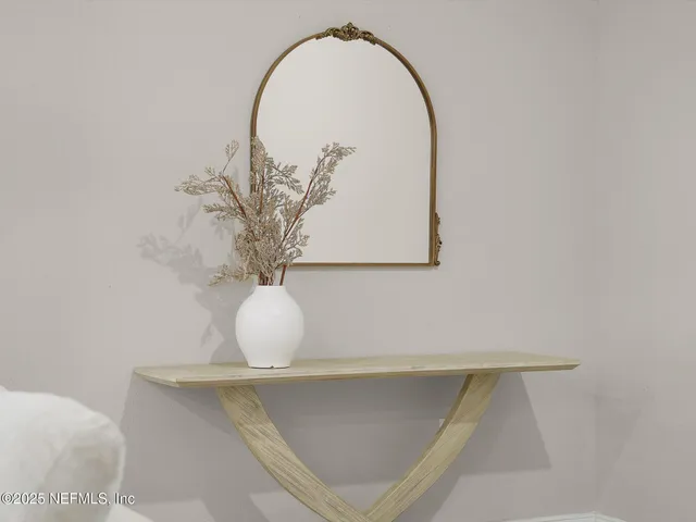 a vase of flowers sitting on a table