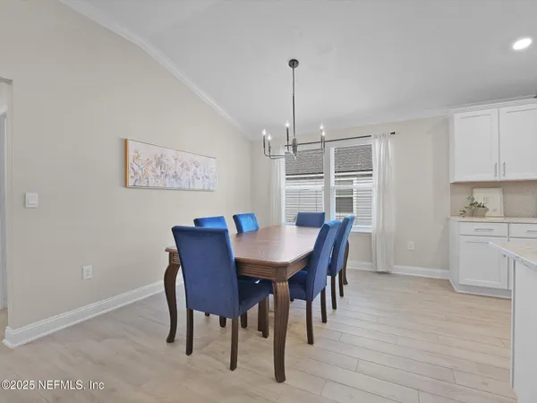 a view of a dining room with furniture