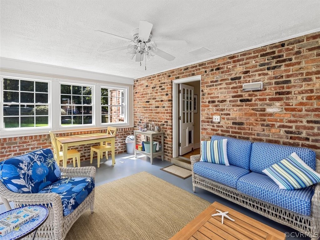 10511 Cherokee Road Richmond, VA 23235 - Photo 20 of 43 Exposed brick wall offers character and warmth to