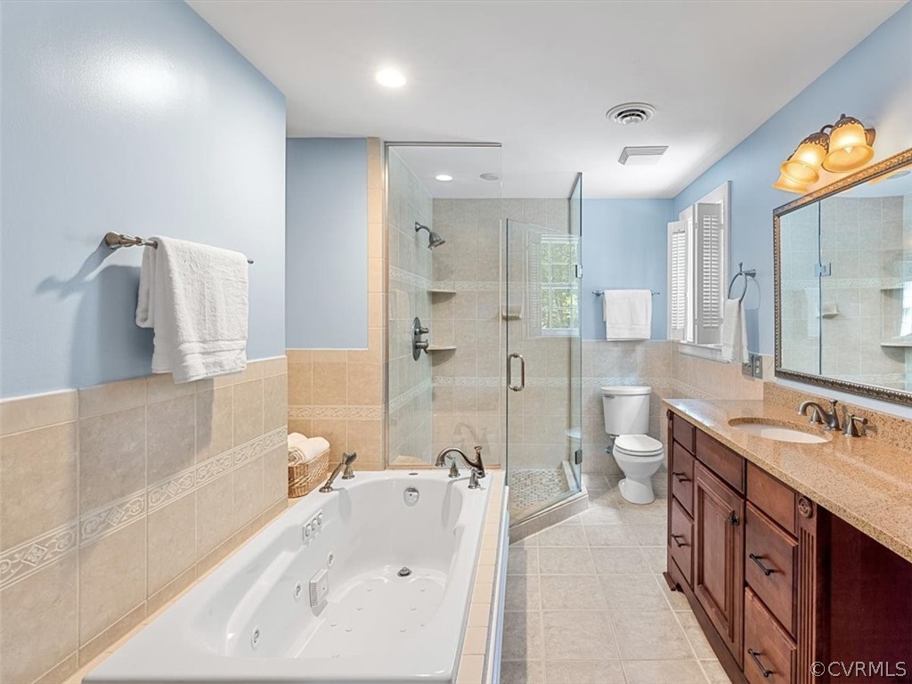 10511 Cherokee Road Richmond, VA 23235 - Photo 27 of 43 Includes a jetted tub as well as a glass enclosed