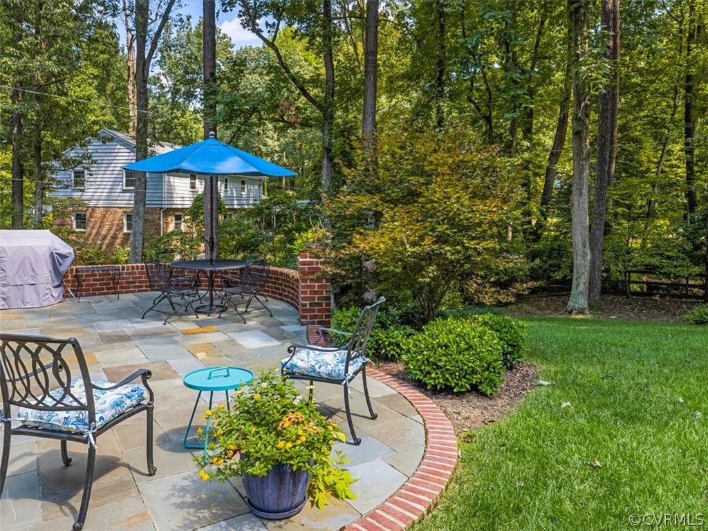 10511 Cherokee Road Richmond, VA 23235 - Photo 37 of 43 Another view of the patio- such a pretty bordering
