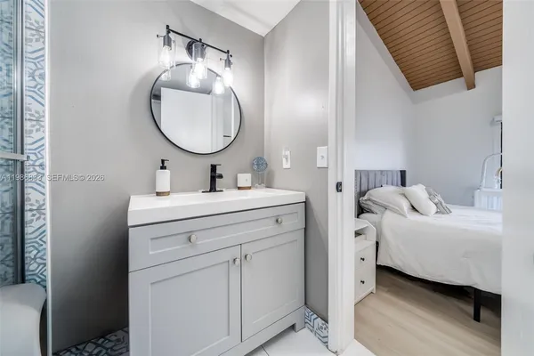 a bathroom with a shower and toilet