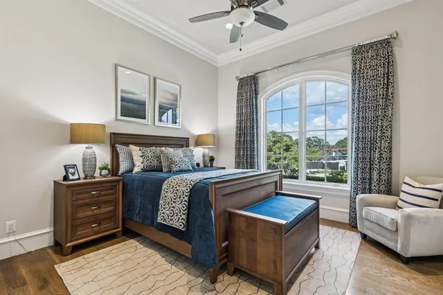 a kitchen with stainless steel appliances granite countertop a sink a microwave refrigerator and dining table