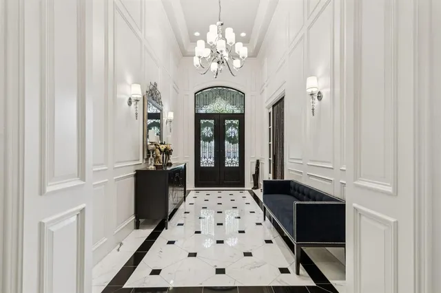 a view of front door and bedroom