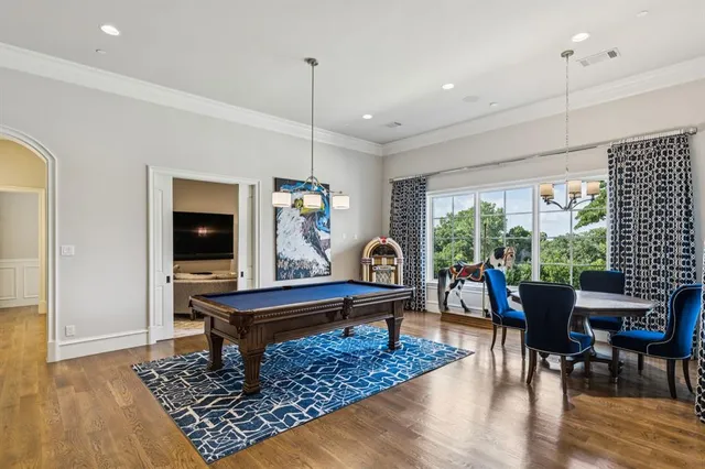 a kitchen with sink stove and refrigerator