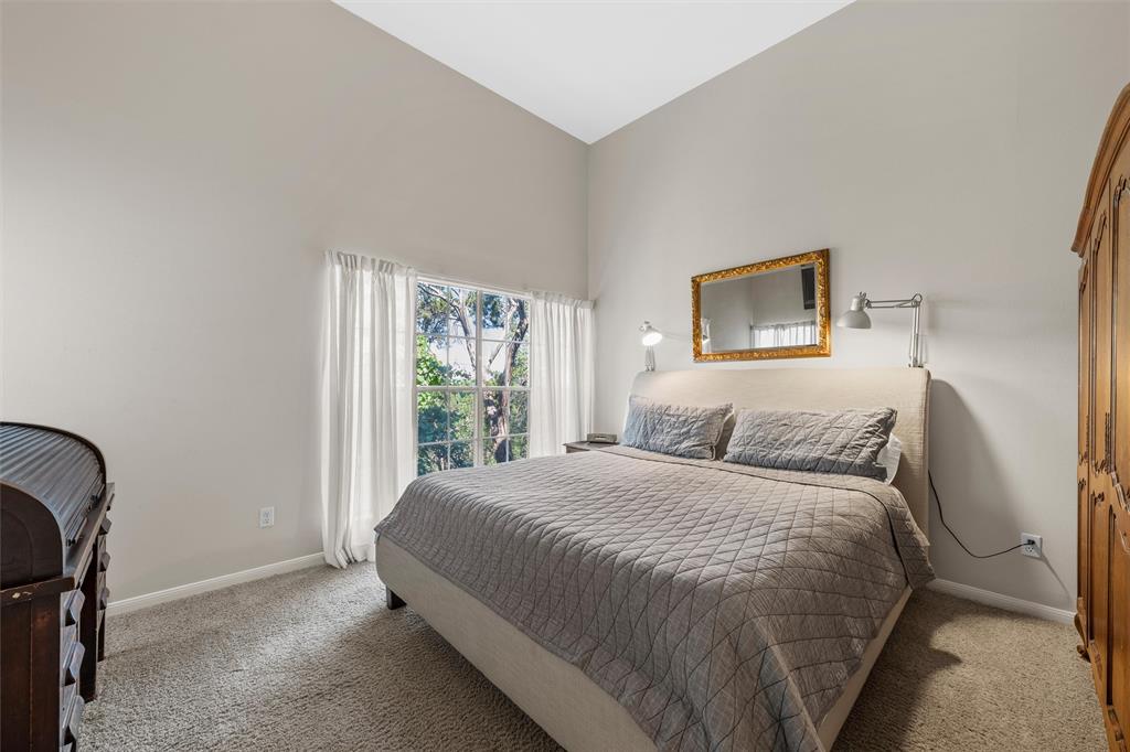 2901 Lake Shore Drive, Unit 405 Waco, TX 76708 - Photo 22 of 31 a bedroom with a bed and a window