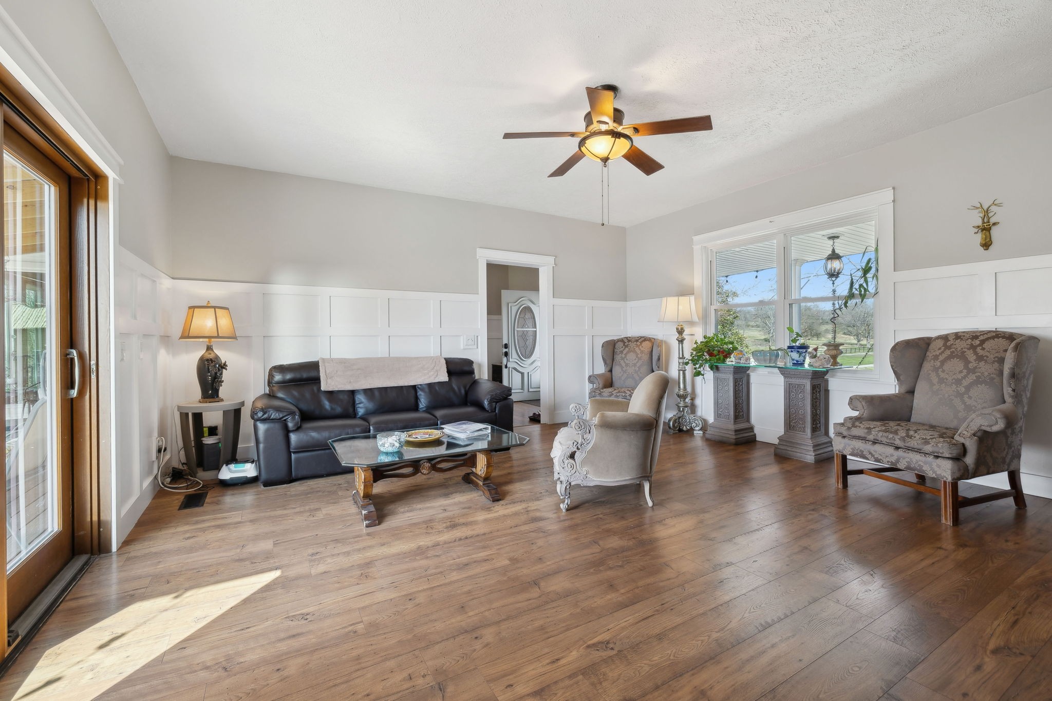 20 Bledsoe Borough Lane Riddleton, TN 37151 - Photo 18 of 72 a living room with furniture and a chandelier