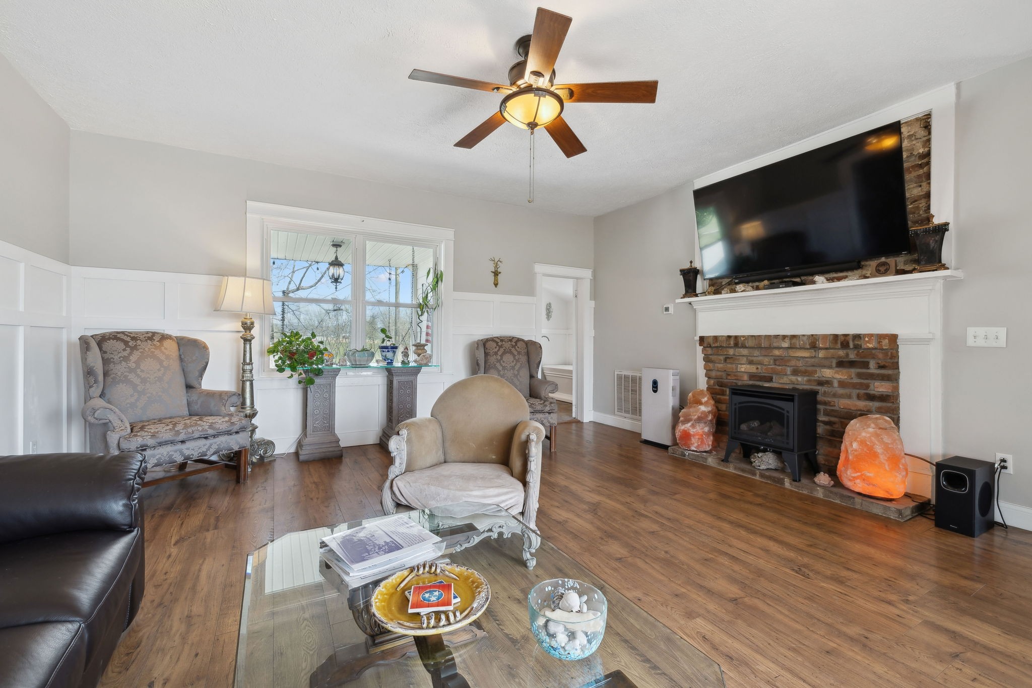 20 Bledsoe Borough Lane Riddleton, TN 37151 - Photo 19 of 72 a living room with furniture a flat screen tv and a fireplace