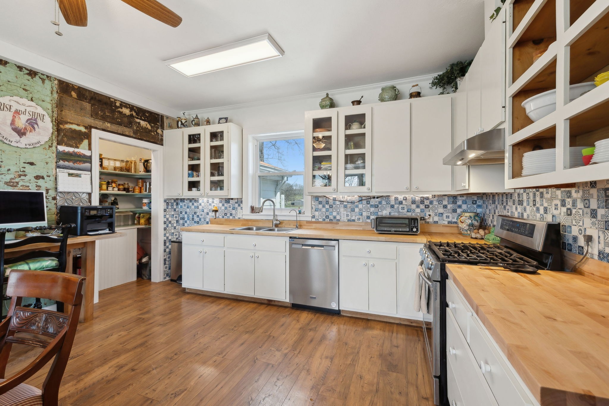 20 Bledsoe Borough Lane Riddleton, TN 37151 - Photo 23 of 72 a kitchen with stainless steel appliances granite countertop a sink and cabinets