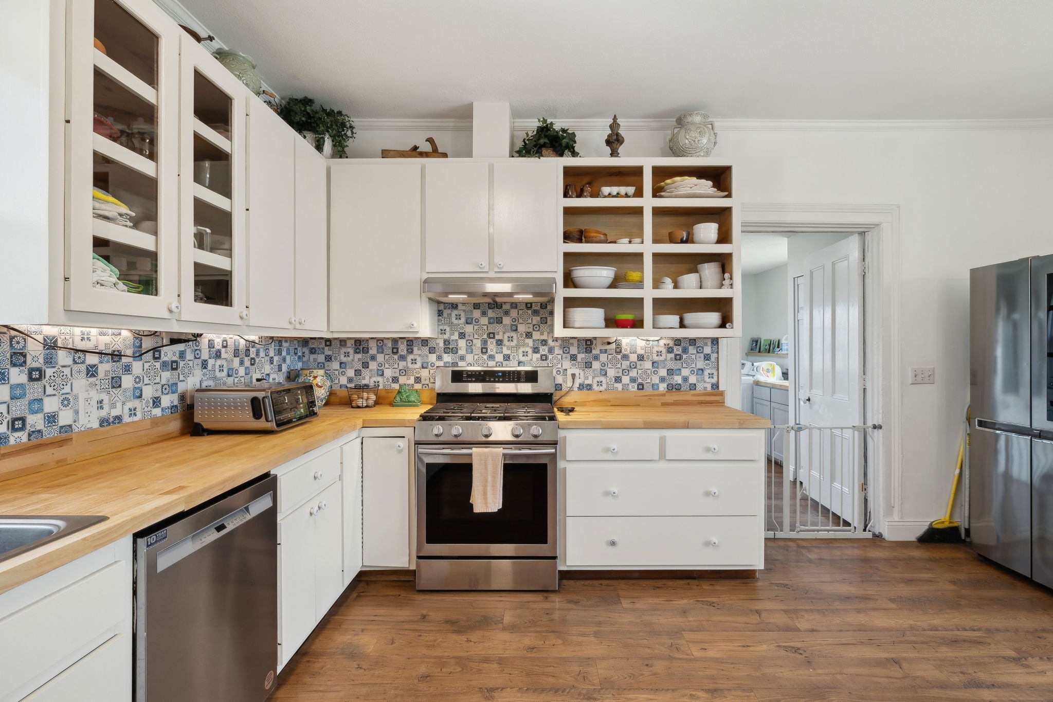 20 Bledsoe Borough Lane Riddleton, TN 37151 - Photo 24 of 72 a kitchen with stainless steel appliances granite countertop a stove and a refrigerator