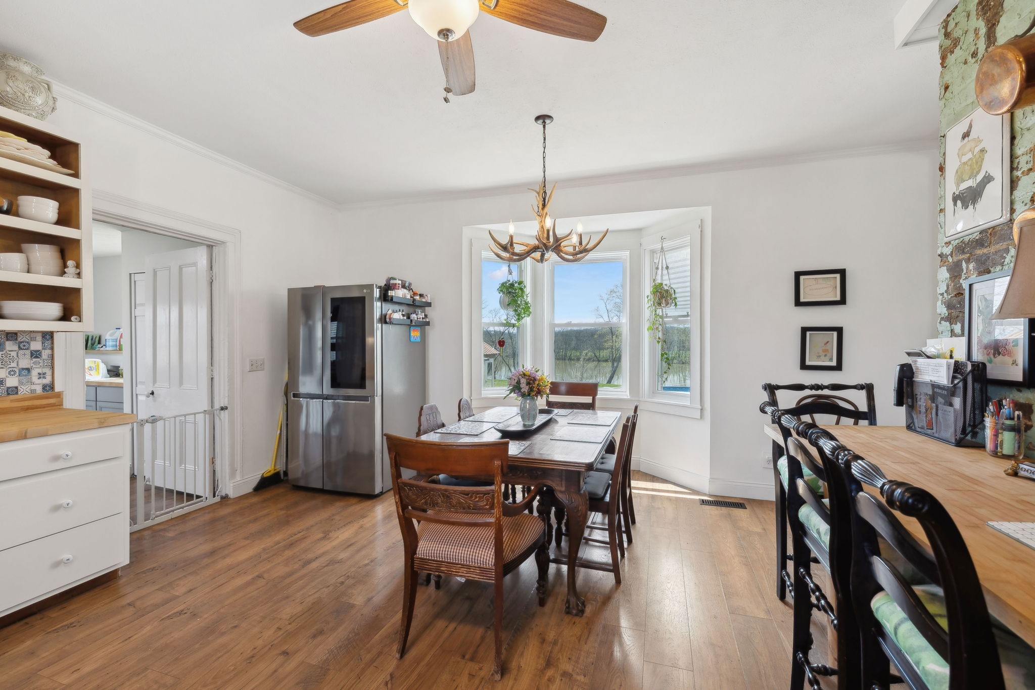 20 Bledsoe Borough Lane Riddleton, TN 37151 - Photo 26 of 72 a view of a dining room with furniture window and wooden floor