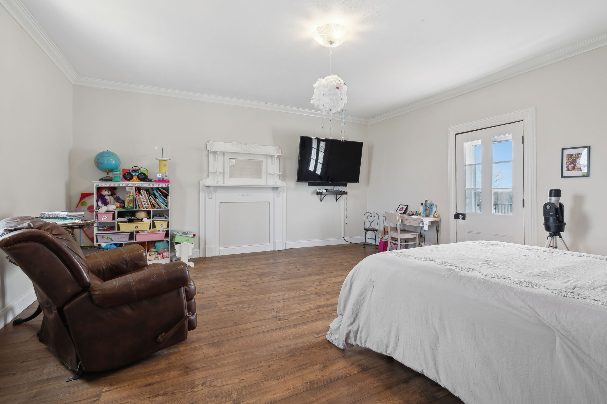 20 Bledsoe Borough Lane Riddleton, TN 37151 - Photo 32 of 72 a bedroom with a bed and a flat screen tv