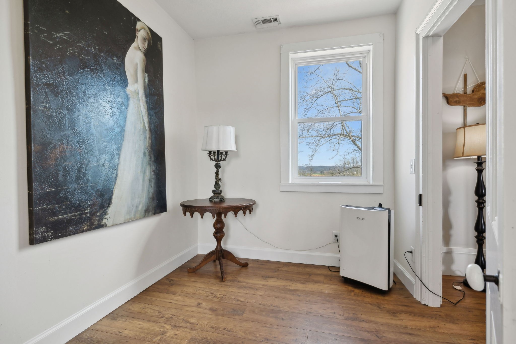 20 Bledsoe Borough Lane Riddleton, TN 37151 - Photo 40 of 72 a view of room with window and wooden floor