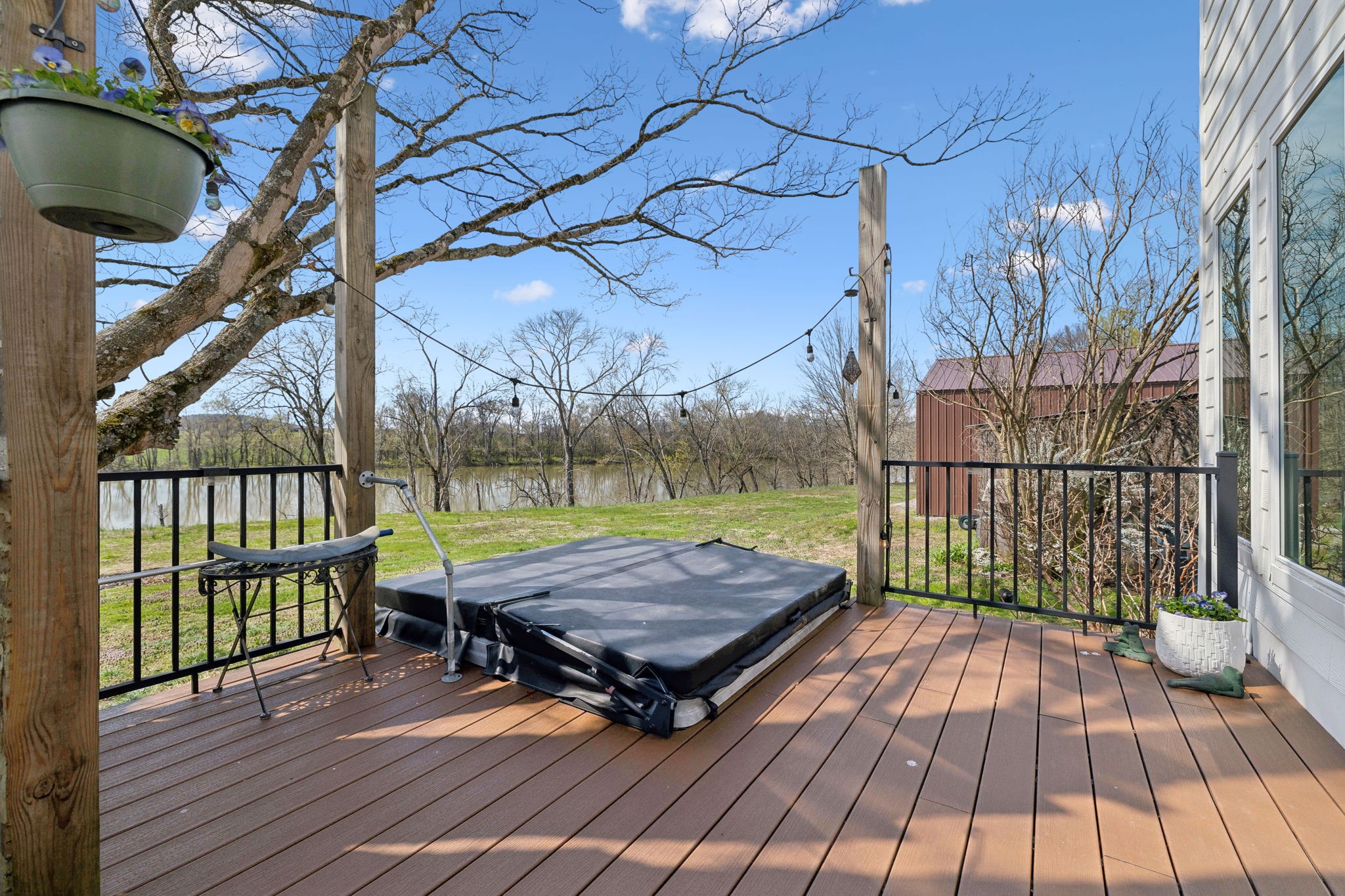 20 Bledsoe Borough Lane Riddleton, TN 37151 - Photo 50 of 72 a view of a wooden floor with a table and chairs