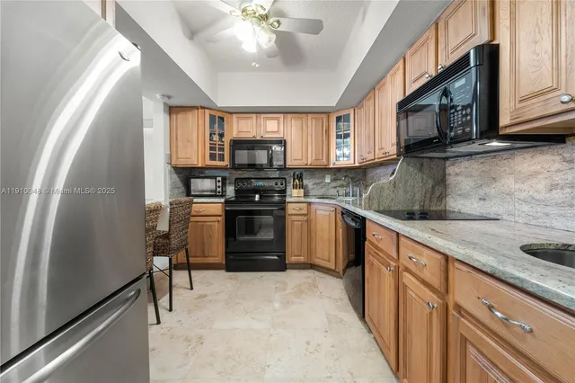 a view of a dining room with furniture and a livingroom