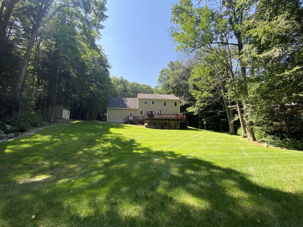 33 Glendale Road Sturbridge, MA 01518 - Photo 2 of 27 a view of a house with a big yard