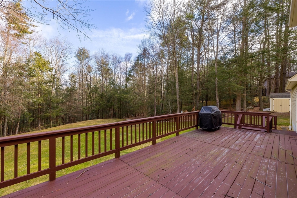 33 Glendale Road Sturbridge, MA 01518 - Photo 25 of 27 a view of a roof deck with wooden floor and fence