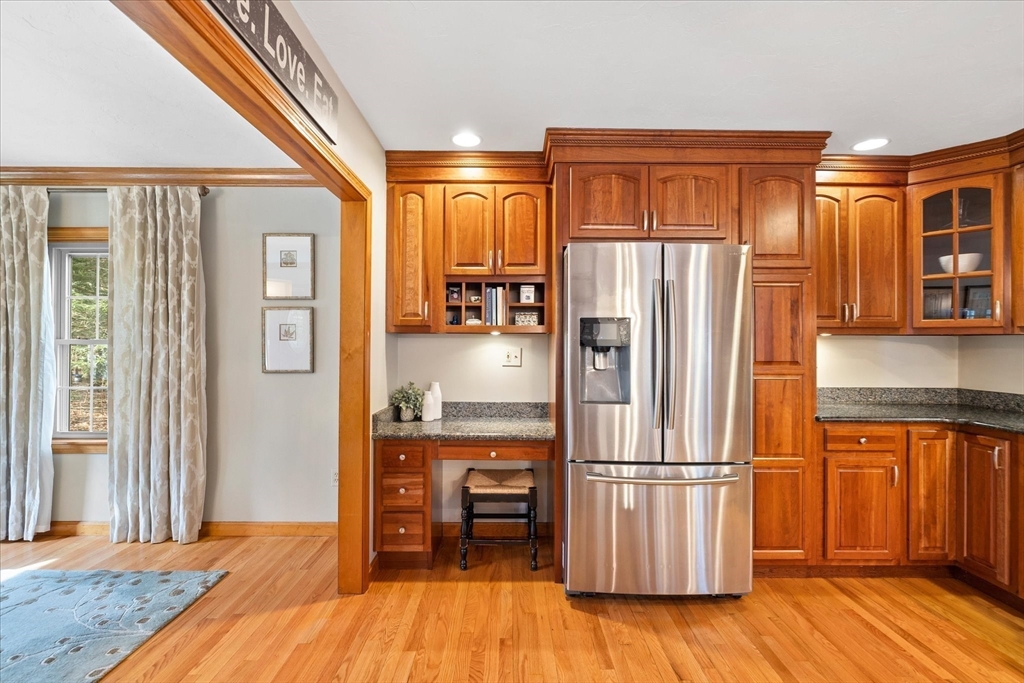 33 Glendale Road Sturbridge, MA 01518 - Photo 8 of 27 a kitchen with stainless steel appliances granite countertop a refrigerator and a stove top oven