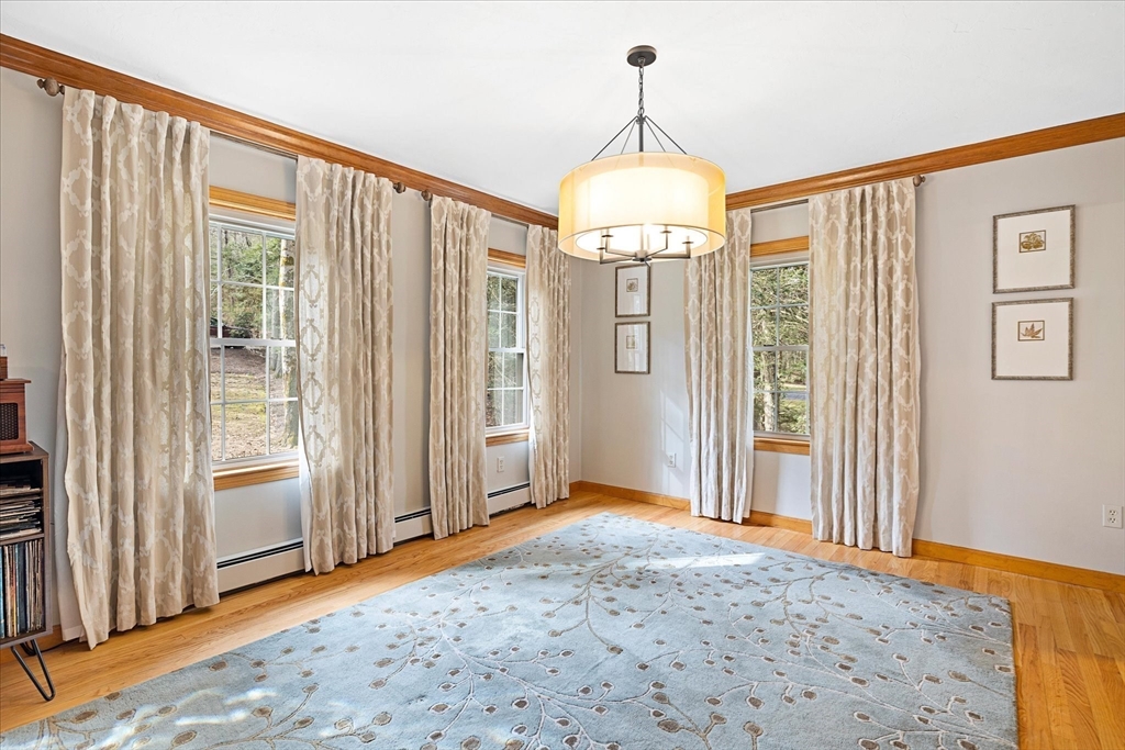 33 Glendale Road Sturbridge, MA 01518 - Photo 10 of 27 a view of a livingroom with a chandelier entryway