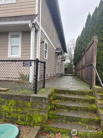 a view of swimming pool with seating space