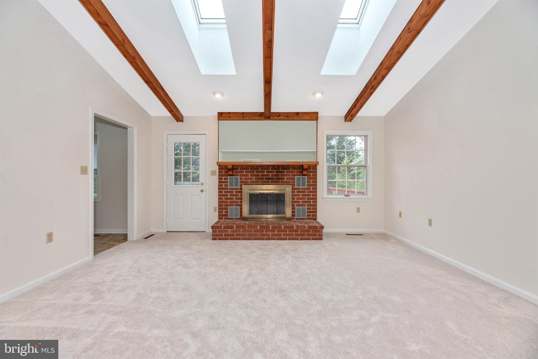 8117 Stone Ridge Drive Frederick, MD 21702 - Photo 8 of 65 Light filled, beautiful wood beams
