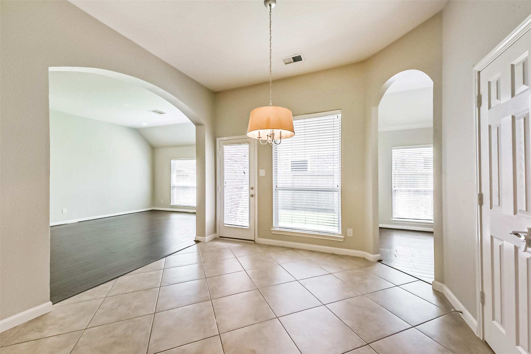 15910 Chart House Court Houston, TX 77044 - Photo 13 of 45 a view of a room with an empty space and chandelier fan