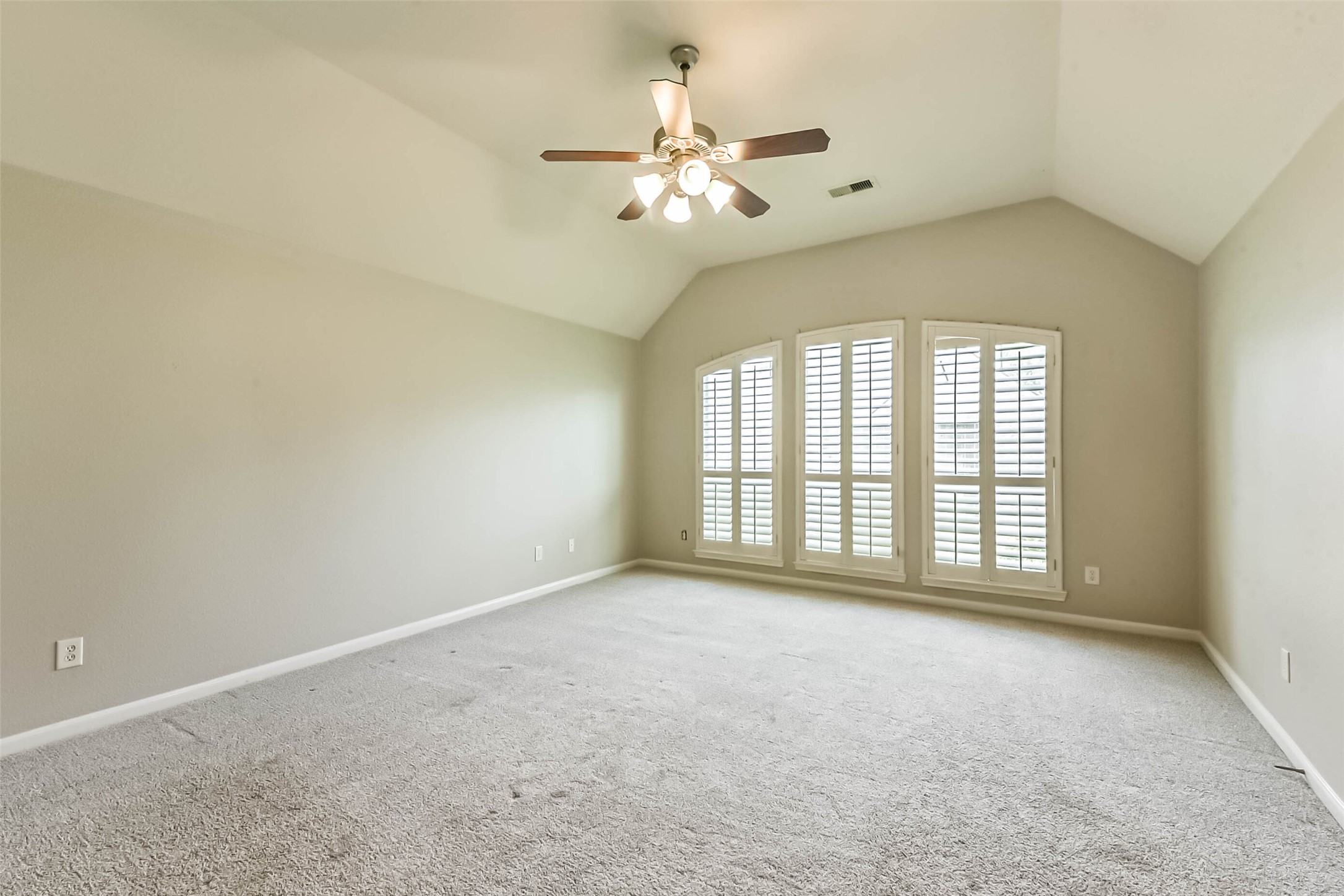 15910 Chart House Court Houston, TX 77044 - Photo 21 of 45 a view of an empty room with a window