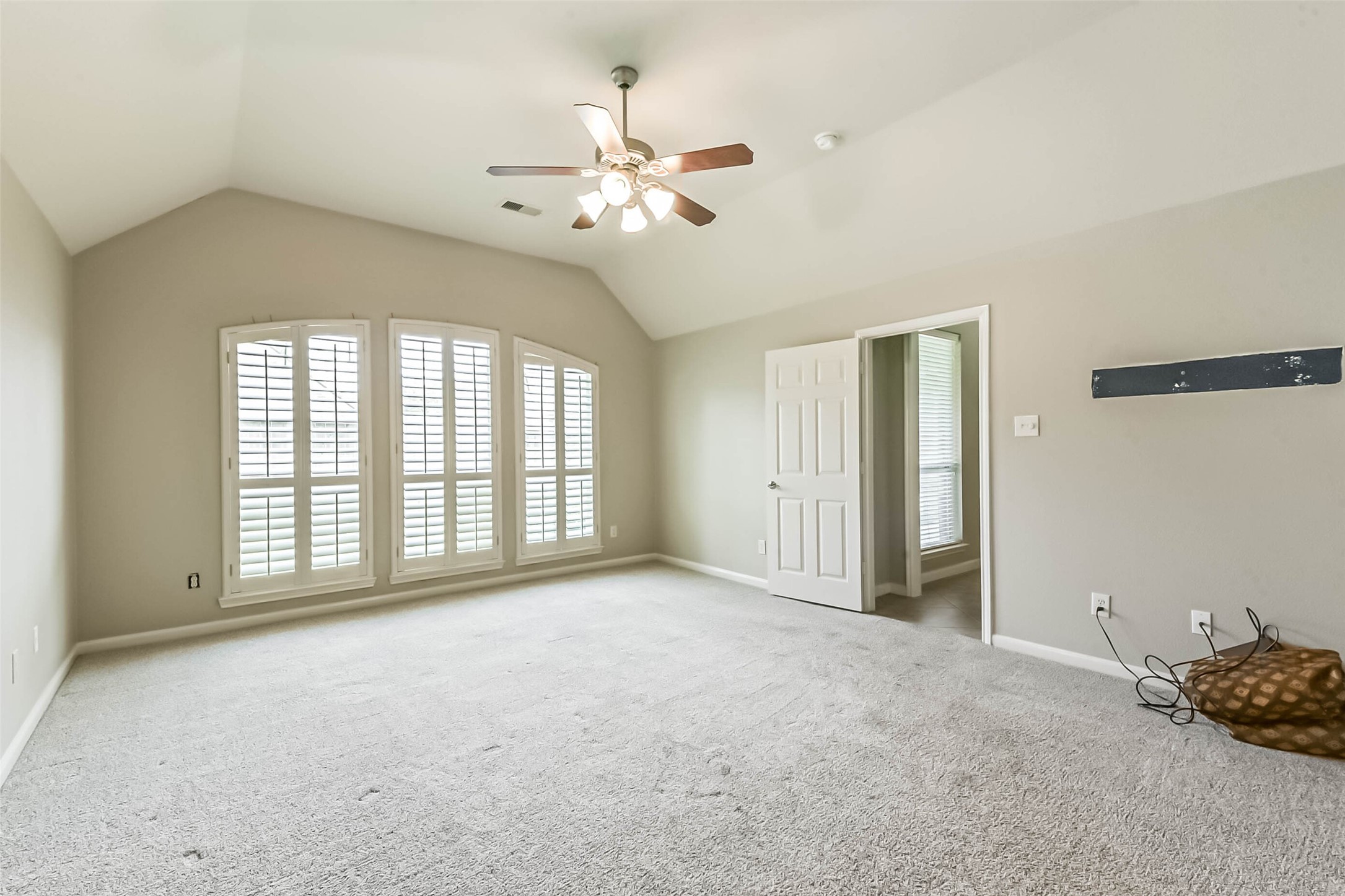 15910 Chart House Court Houston, TX 77044 - Photo 22 of 45 a view of an empty room with a window