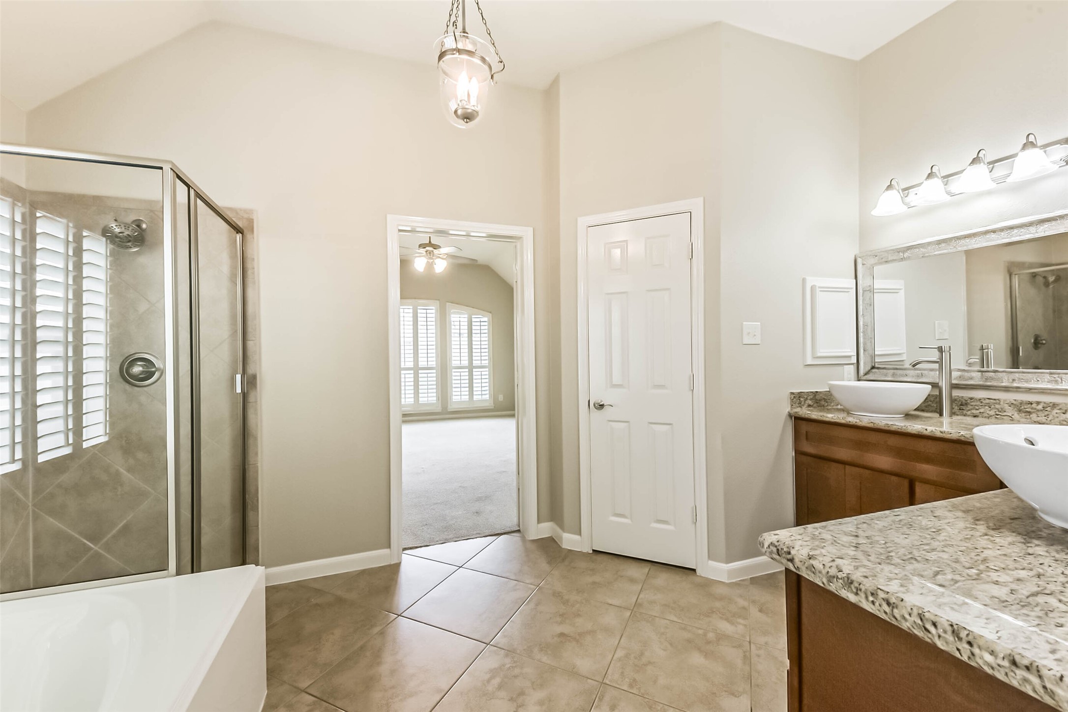 15910 Chart House Court Houston, TX 77044 - Photo 28 of 45 a view of a kitchen cabinets and a wooden floor