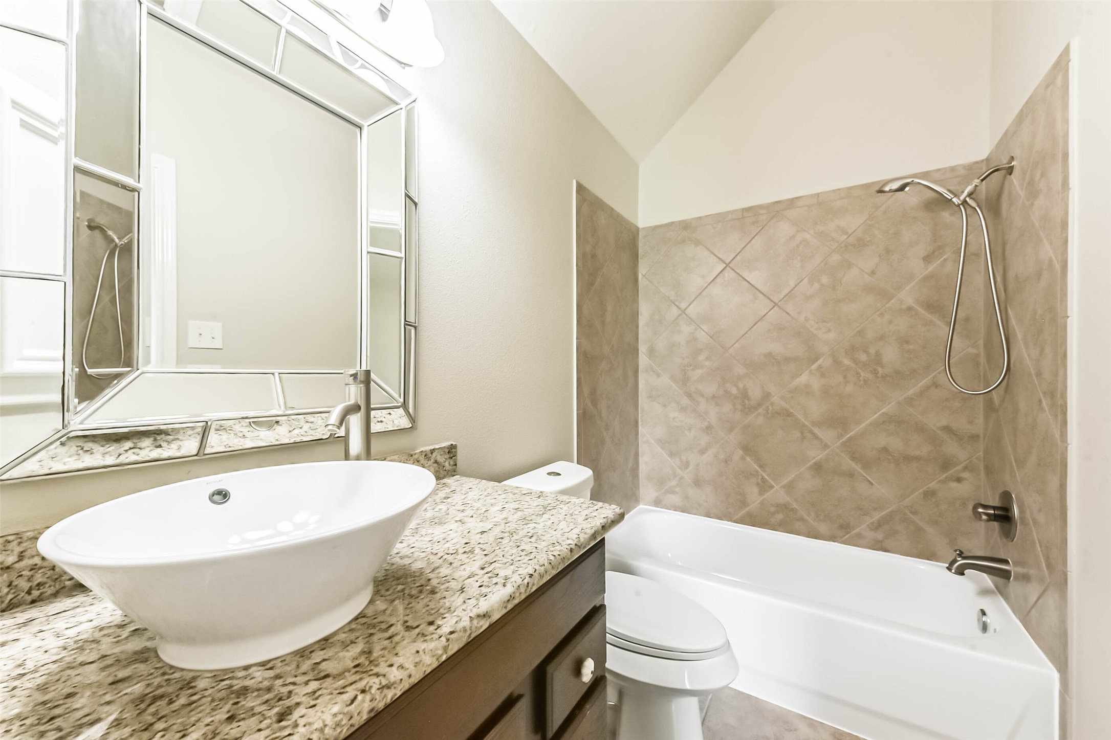 15910 Chart House Court Houston, TX 77044 - Photo 32 of 45 a bathroom with a granite countertop sink and a mirror