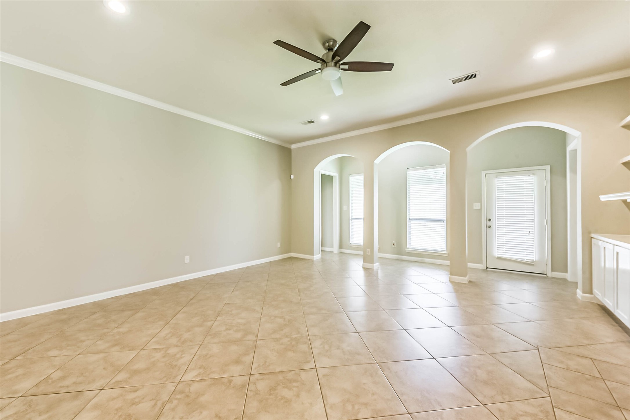 15910 Chart House Court Houston, TX 77044 - Photo 4 of 45 a view of an empty room with a window