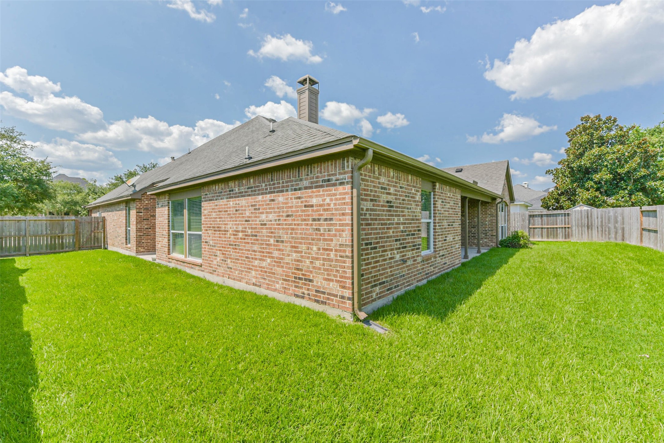15910 Chart House Court Houston, TX 77044 - Photo 41 of 45 a view of backyard with a garden and entertaining space
