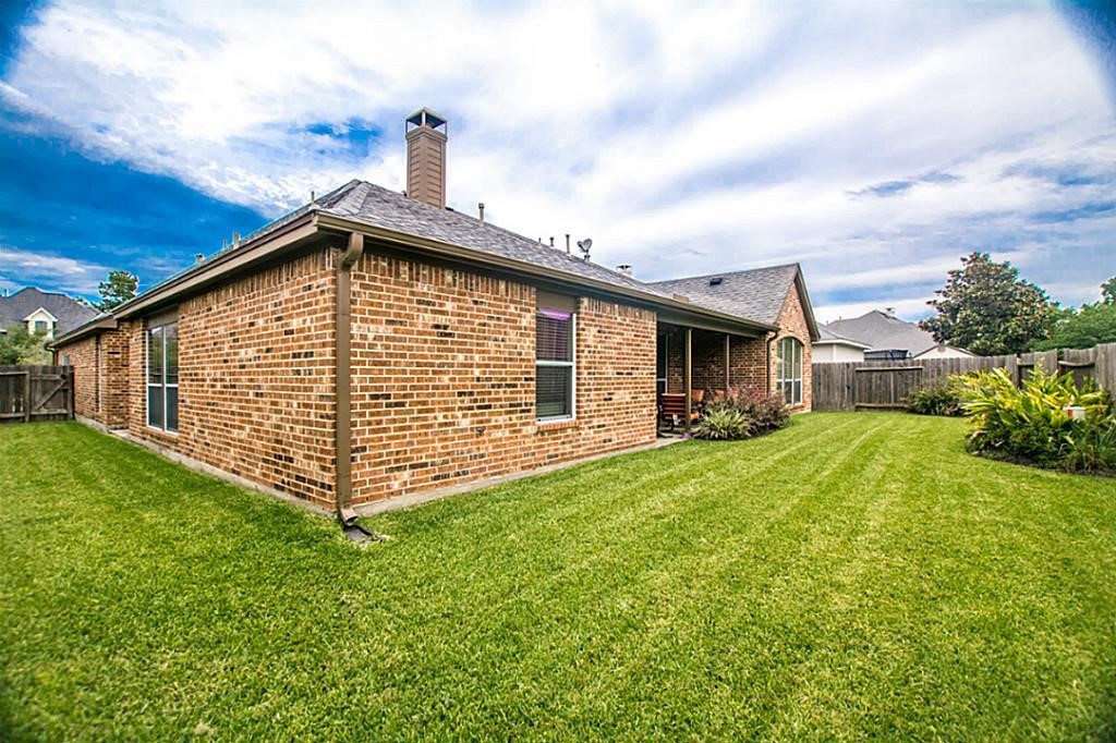 15910 Chart House Court Houston, TX 77044 - Photo 44 of 45 a front view of a house with garden