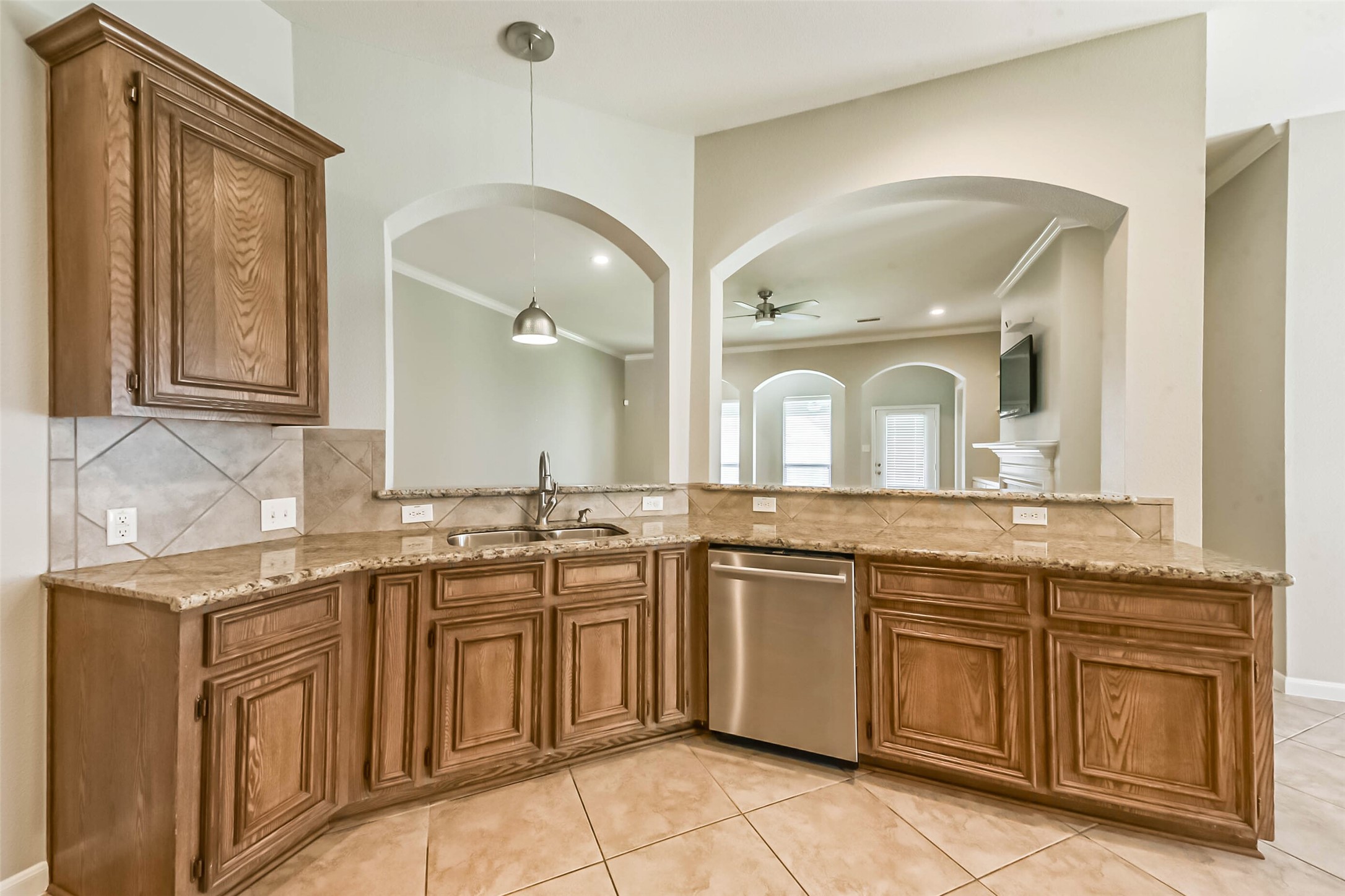 15910 Chart House Court Houston, TX 77044 - Photo 10 of 45 a spacious bathroom with a granite countertop double vanity sink and mirror