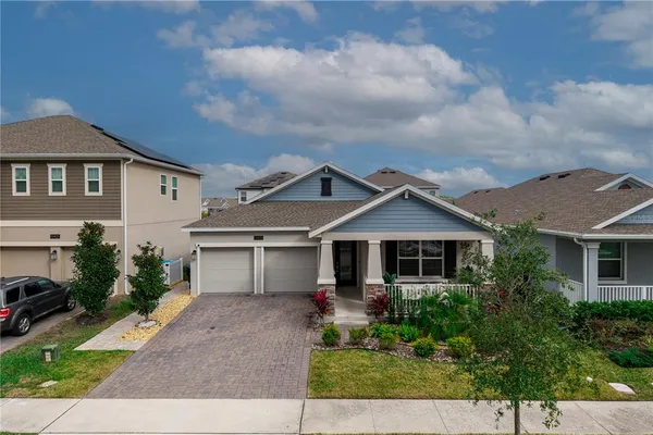 front view of a house with a yard