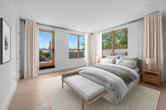 a bathroom with a toilet sink and shower