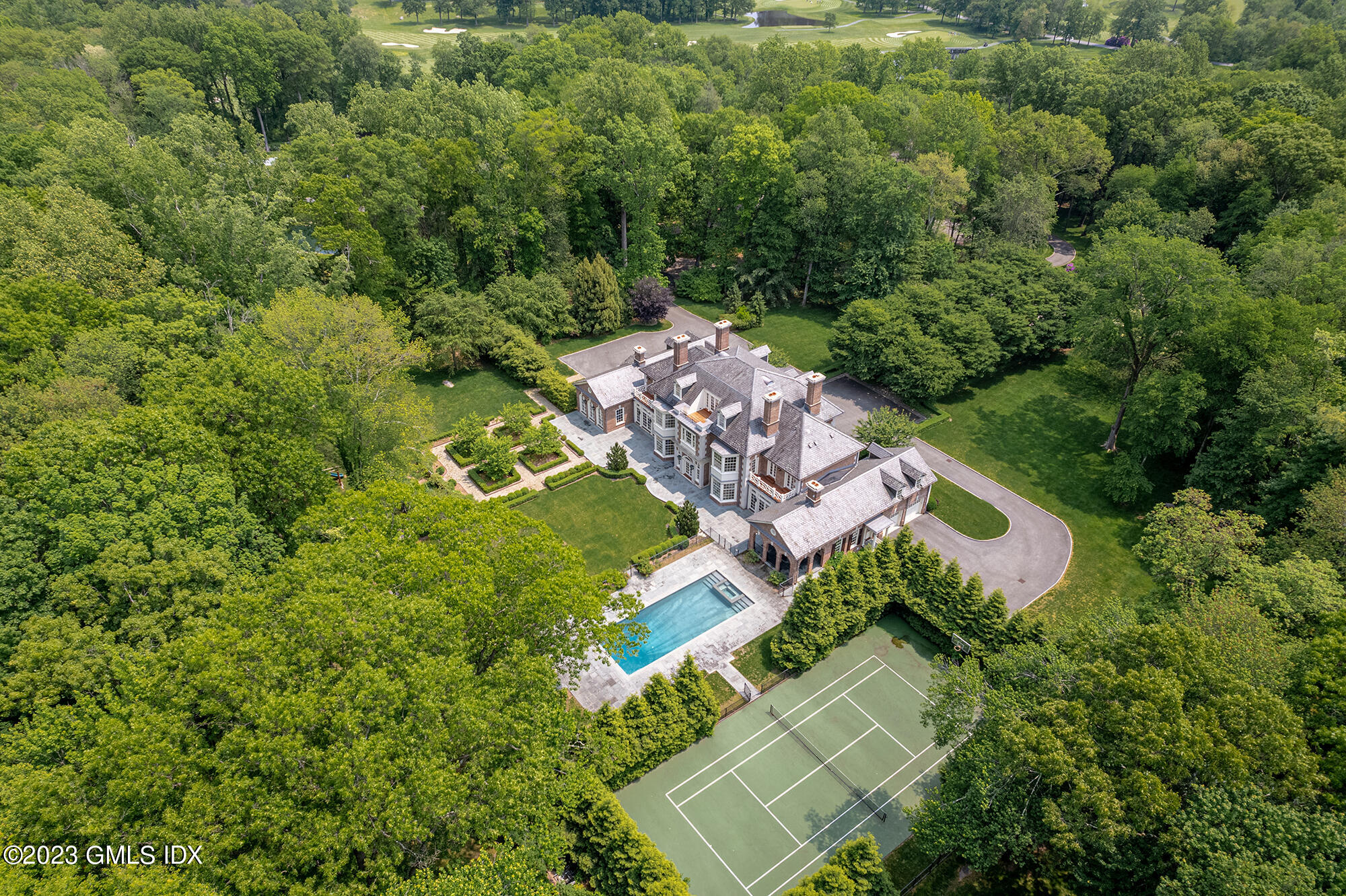 3 Hekma Road Greenwich, CT 06831 - Photo 6 of 6 an aerial view of a house with a yard