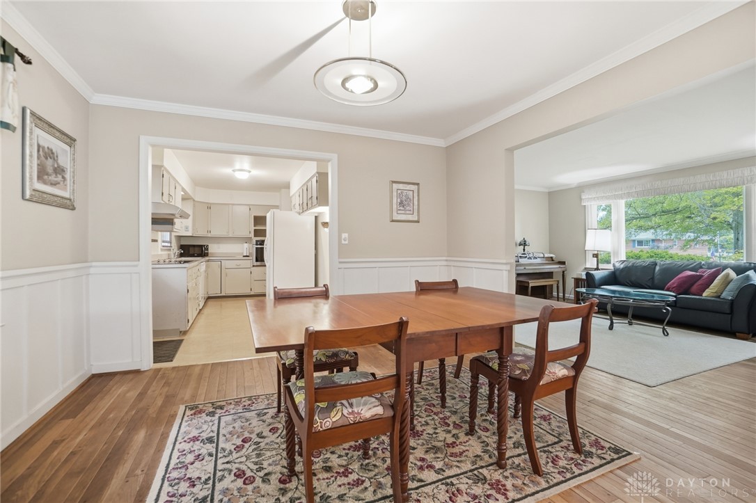 6119 Flemington Road Dayton, OH 45459 - Photo 13 of 76 This inviting dining area seamlessly connects to the kitchen and living space, offering an ideal flow for daily living.