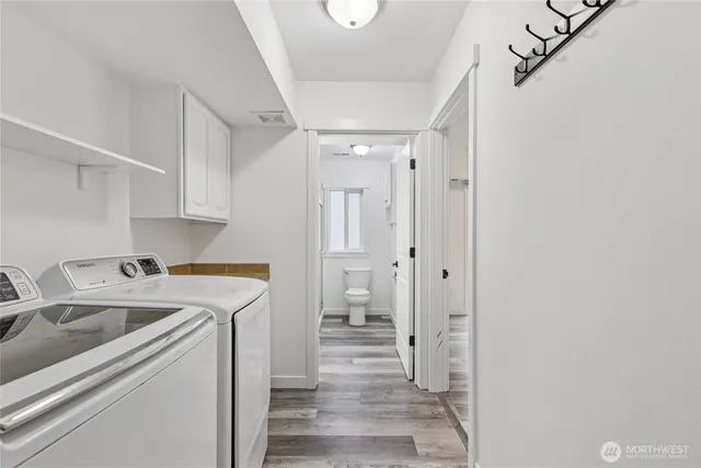 a utility room with dryer and washer