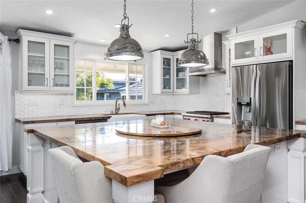 2212 Rim Road Duarte, CA 91008 - Photo 15 of 52 a kitchen with stainless steel appliances granite countertop a sink a stove and a refrigerator