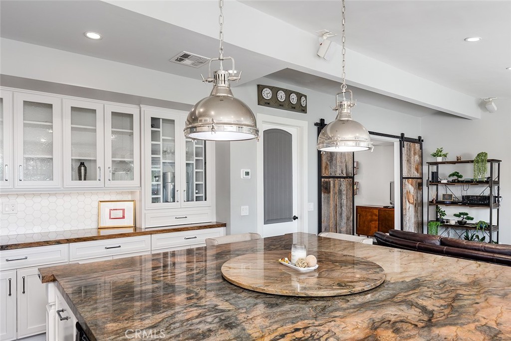 2212 Rim Road Duarte, CA 91008 - Photo 17 of 52 a kitchen with stainless steel appliances granite countertop a sink and a refrigerator