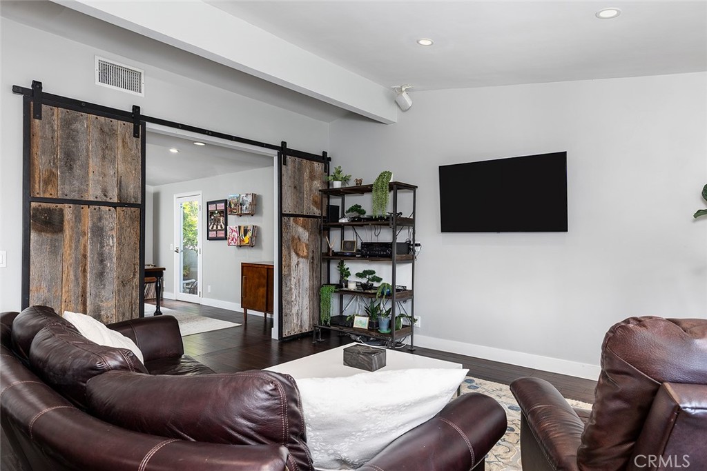 2212 Rim Road Duarte, CA 91008 - Photo 20 of 52 a living room with furniture and a flat screen tv