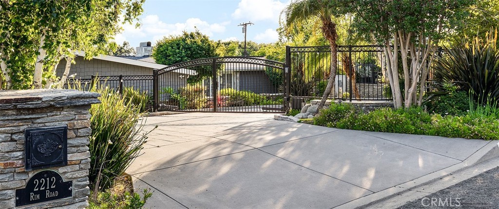 2212 Rim Road Duarte, CA 91008 - Photo 2 of 52 a view of a house with a yard