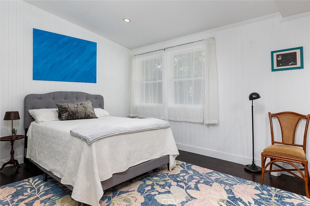 2212 Rim Road Duarte, CA 91008 - Photo 22 of 52 a bedroom with a bed and wooden floor