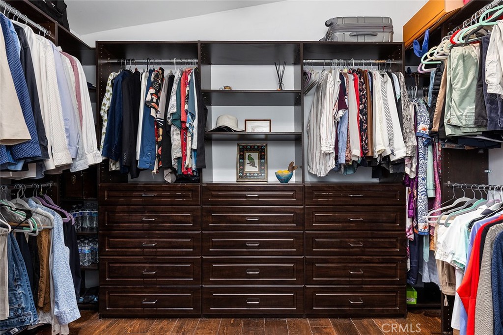 2212 Rim Road Duarte, CA 91008 - Photo 28 of 52 a view of walk in closet with clothes and shoes