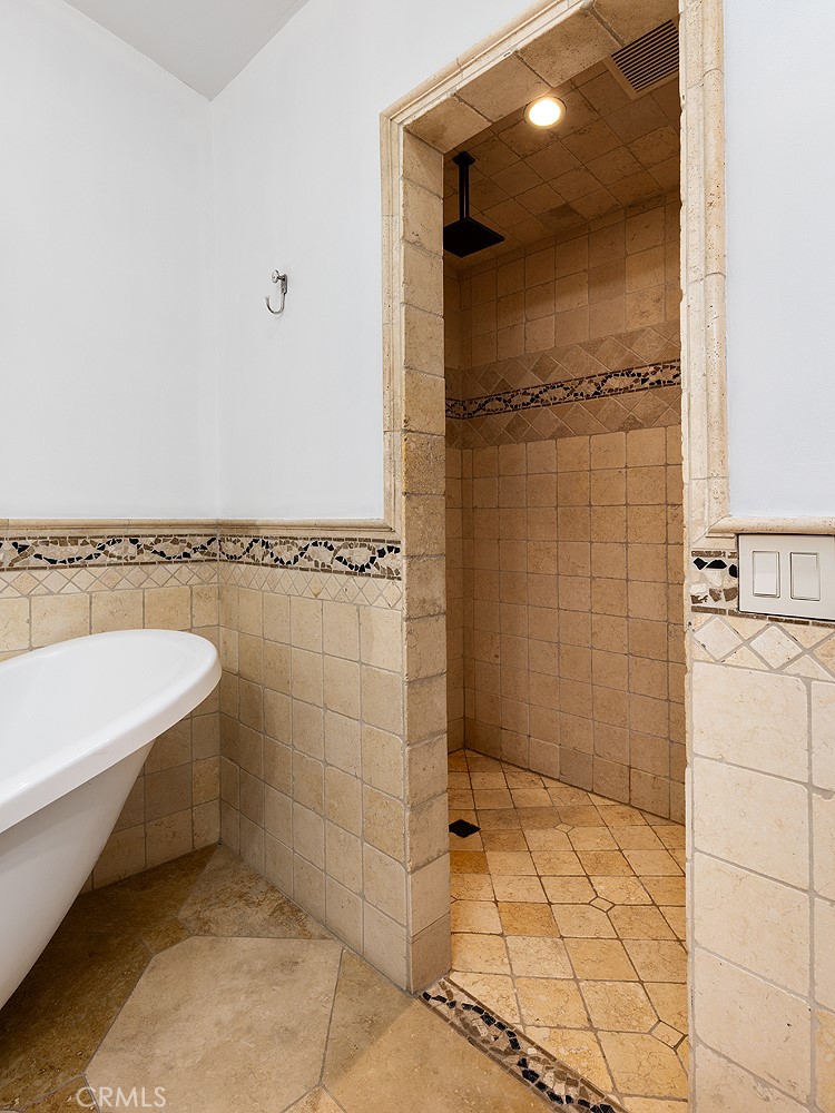 2212 Rim Road Duarte, CA 91008 - Photo 30 of 52 a bathroom with a bathtub and shower