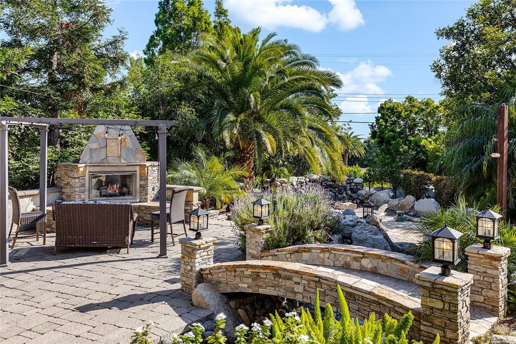 2212 Rim Road Duarte, CA 91008 - Photo 34 of 52 a view of a house with backyard and sitting area