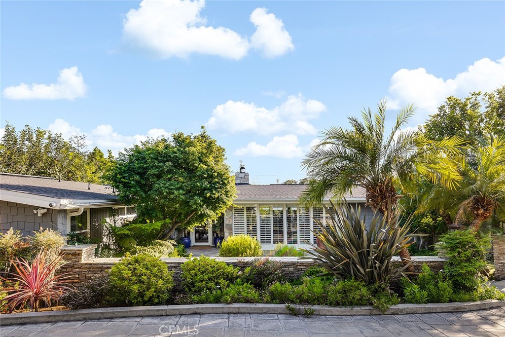 2212 Rim Road Duarte, CA 91008 - Photo 4 of 52 a front view of a house with garden