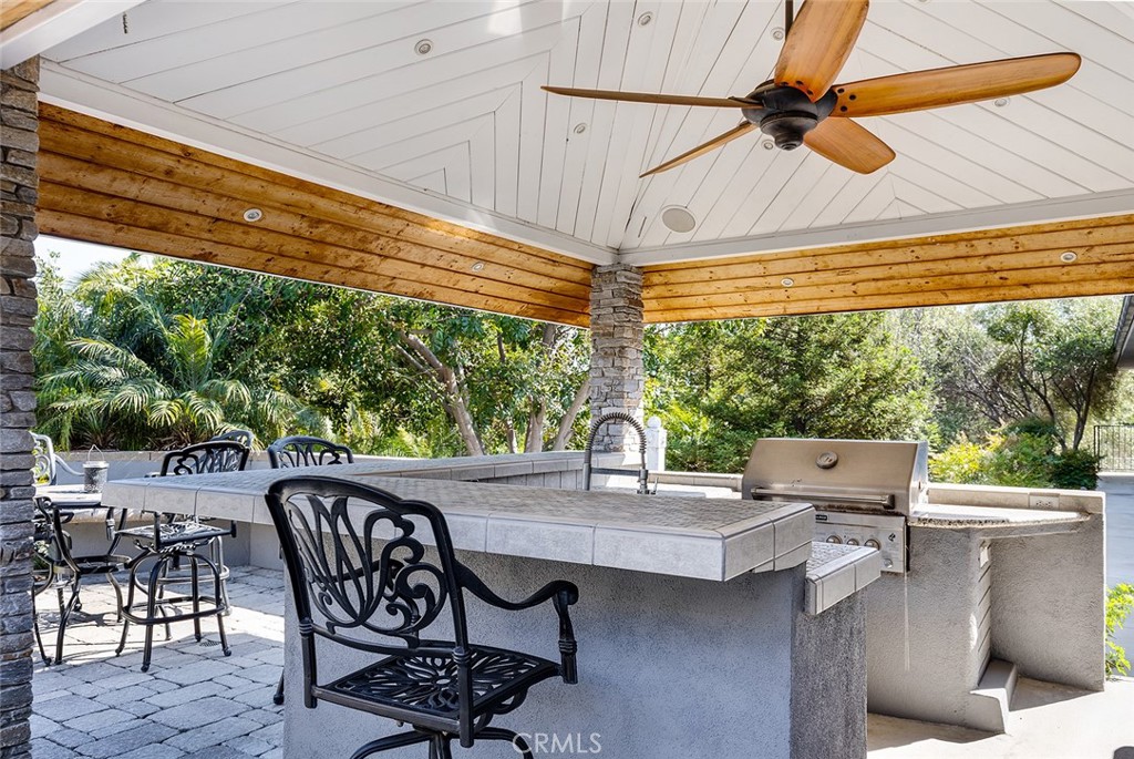 2212 Rim Road Duarte, CA 91008 - Photo 43 of 52 a outdoor dining space with furniture and umbrella